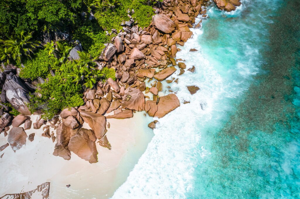 Aerial drone photo of Seychelles tropical beach Anse Marron at La Digue island