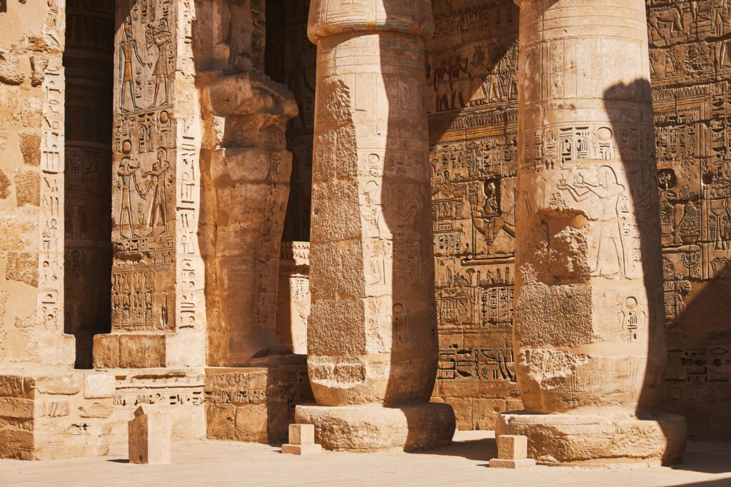 Columns with Egyptian hieroglyphs and ancient symbols. Famous Egyptian landmark. Ancient Egypt