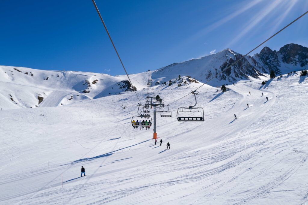 People riding ski lift the ski resort in andorra