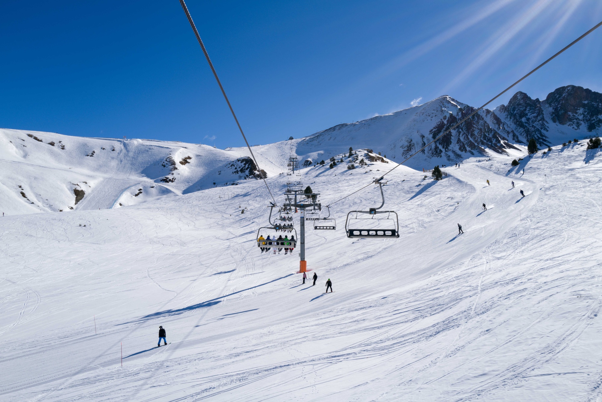 People riding ski lift the ski resort in andorra